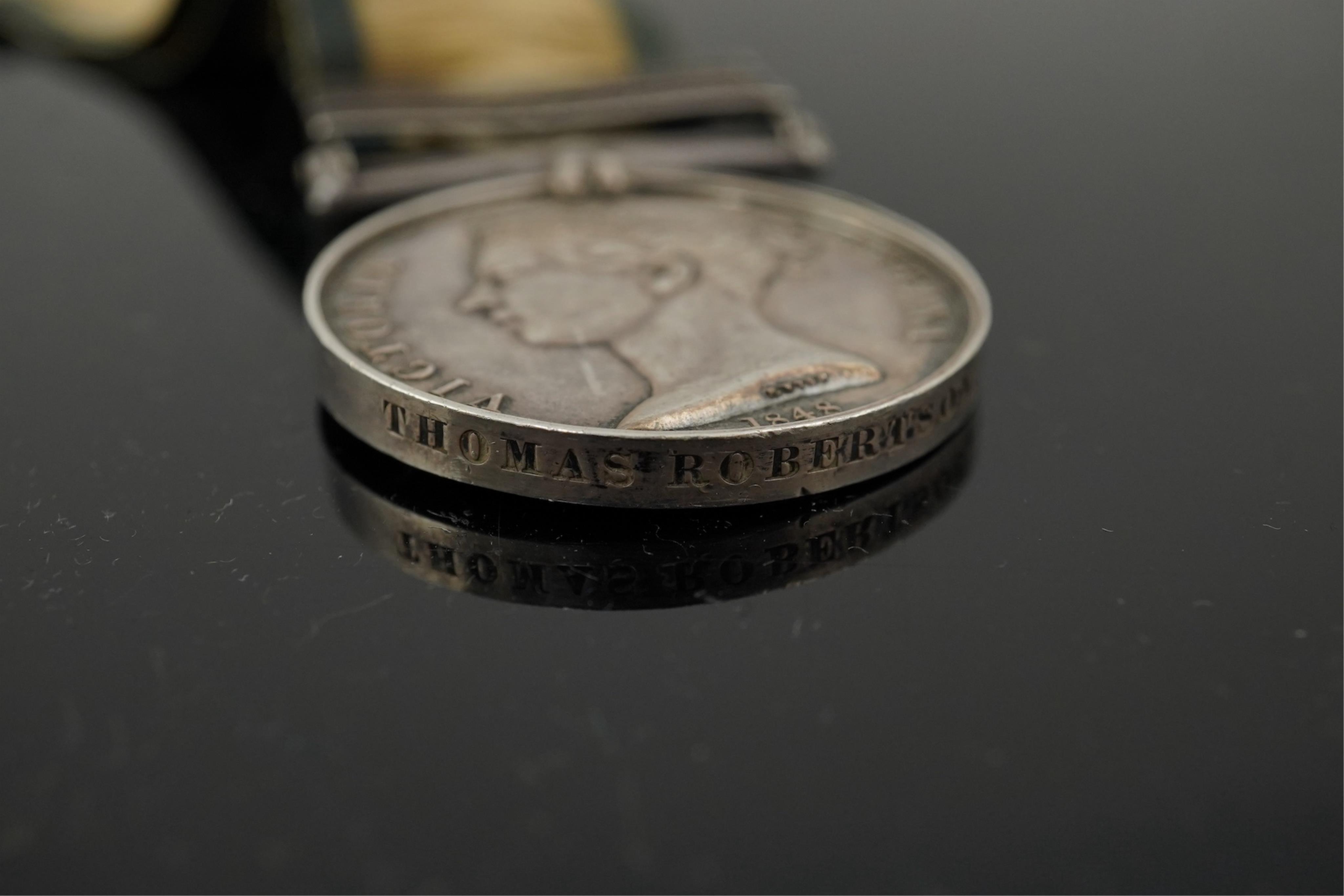 Battle of Trafalgar interest; Four medals awarded to members of the Robertson family. A Victorian naval General Service Medal to Thomas Robertson, Surgeon, with three bars for;, Sirius 17 April 1806, Trafalgar and Egypt,